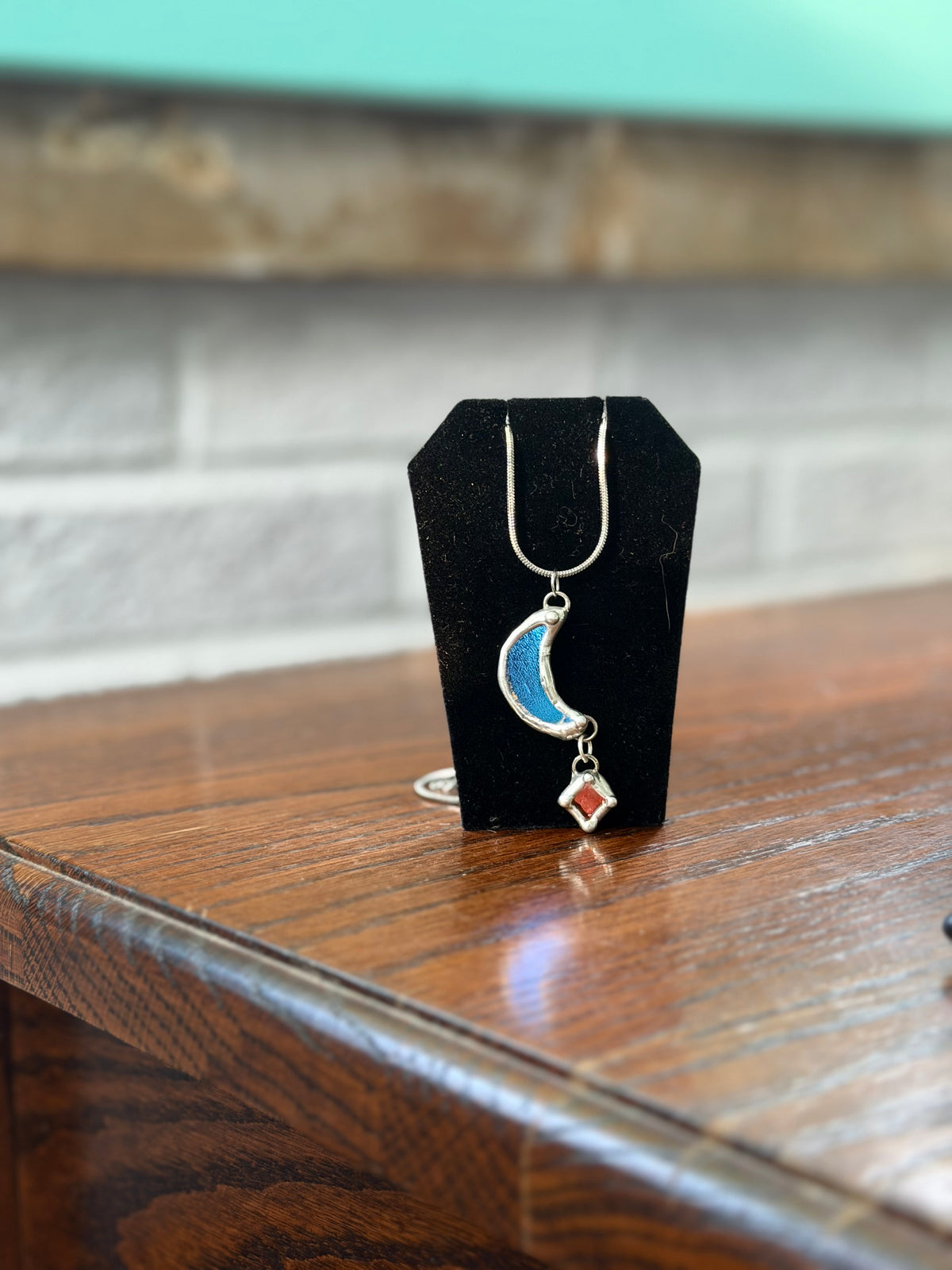 Dichroic Moon with Dangling Star small scratch on moon, reflected in pricing