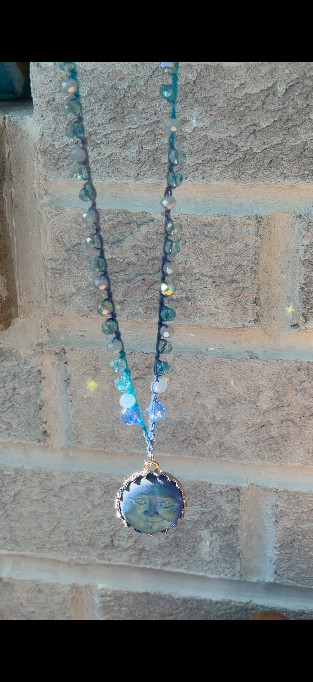 Crocheted moon necklace
