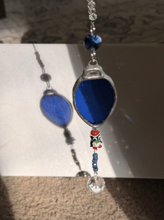 Christmas light Suncatcher with penguin